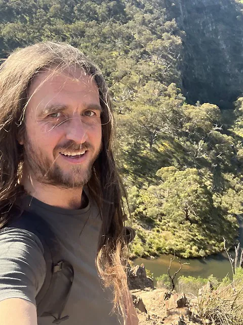 Richard Tronson, psychotherapist, outdoors in bushland